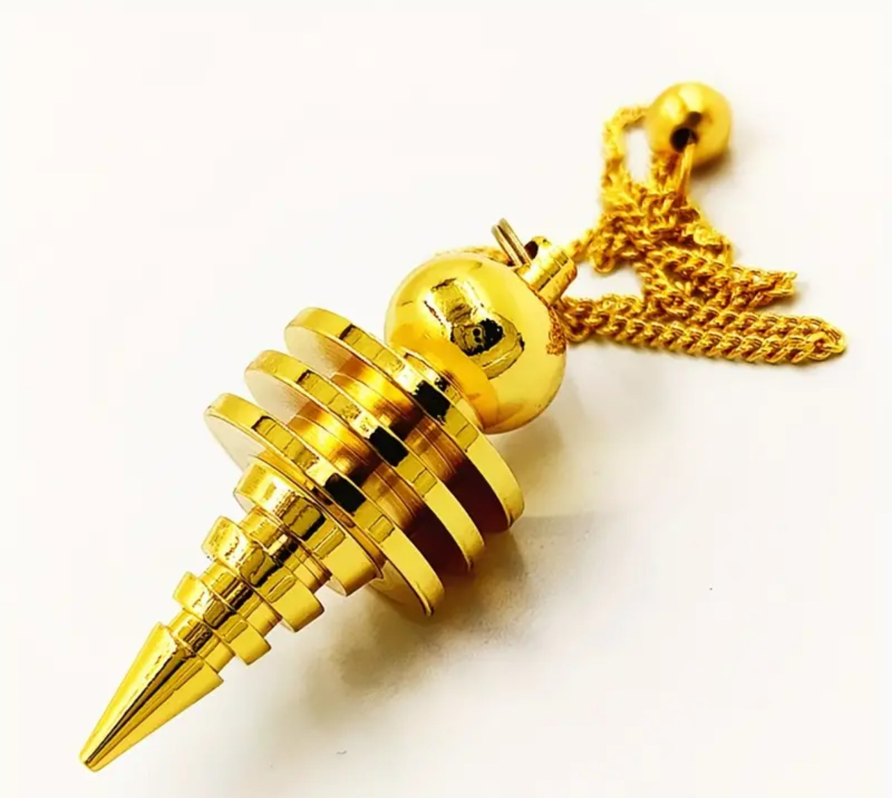 Péndulo de acero color Dorado